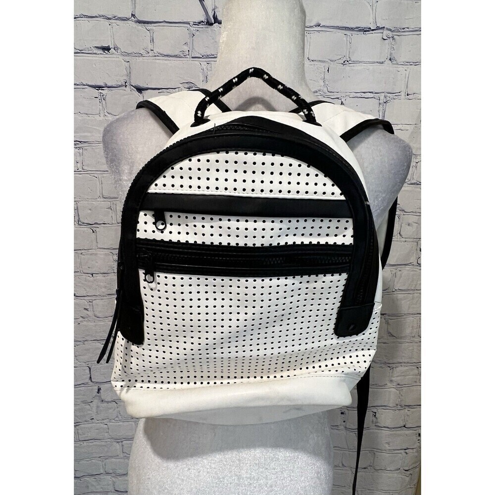 Merona white with black trim Faux leather backpack Lots of Pockets adjustable